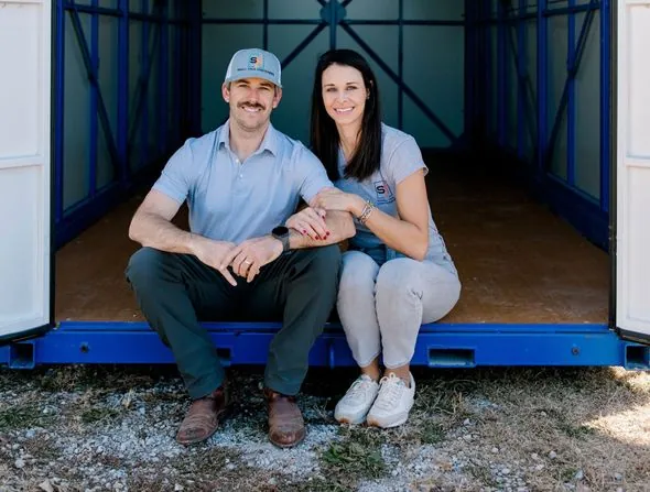The husband-and-wife owners of Small Haul Containers